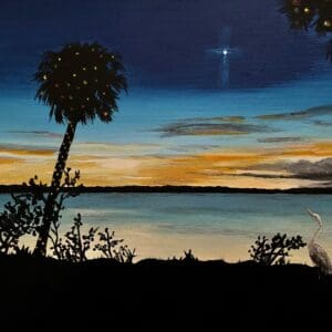 A heron graces the scene near a serene body of water at sunset, framed by the silhouette of palm trees and lush foliage, beneath a darkening sky where one bright star shines—just as beautifully depicted in Dove Christmas Cards.